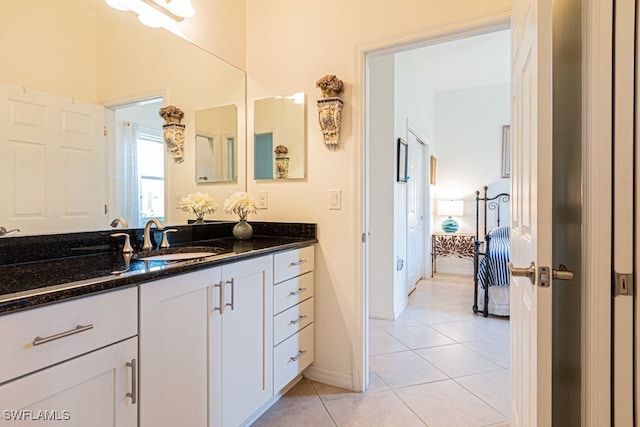 bathroom with vanity and tile patterned floors