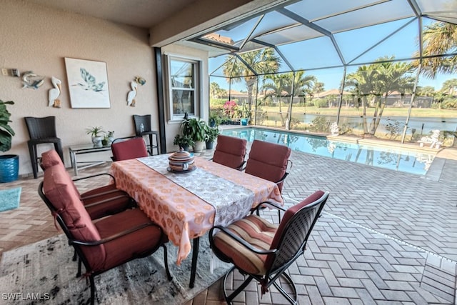 view of patio / terrace featuring a lanai