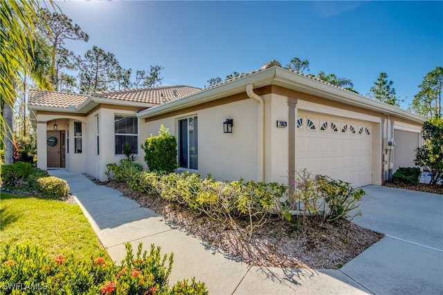 view of front of property with a garage