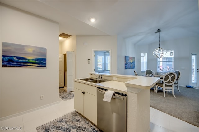 kitchen featuring dishwasher, sink, plenty of natural light, and pendant lighting