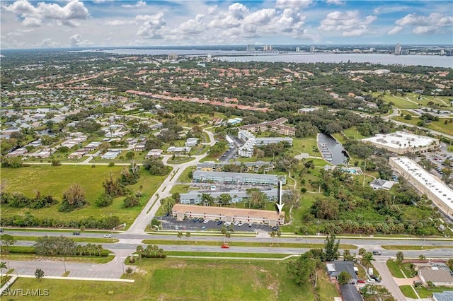 drone / aerial view with a water view