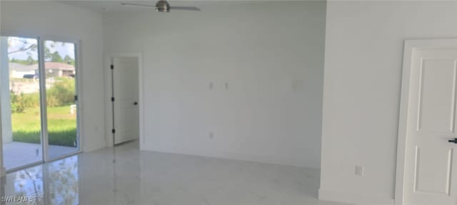 unfurnished room with ceiling fan