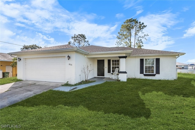 ranch-style house with a garage and a front lawn