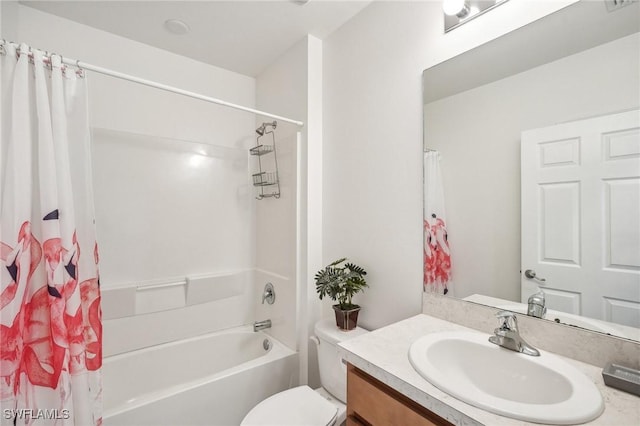 bathroom featuring toilet, shower / bath combination with curtain, and vanity