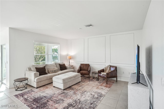 living room featuring light tile patterned floors