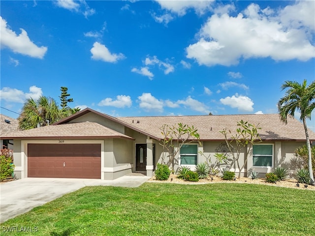 ranch-style home featuring a front yard and a garage