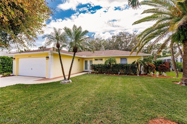 ranch-style home with a front yard and a garage