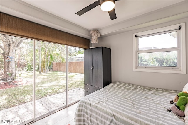 bedroom featuring wood-type flooring and ceiling fan