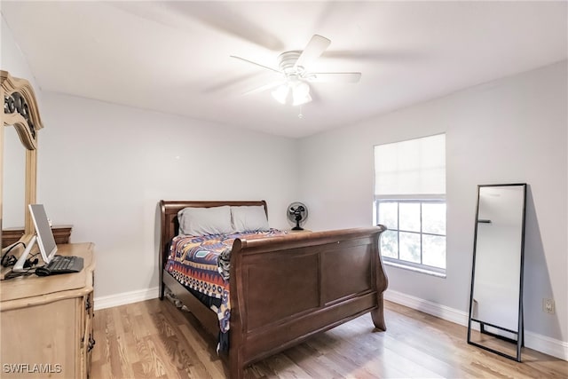 bedroom featuring ceiling fan and light wood-type flooring