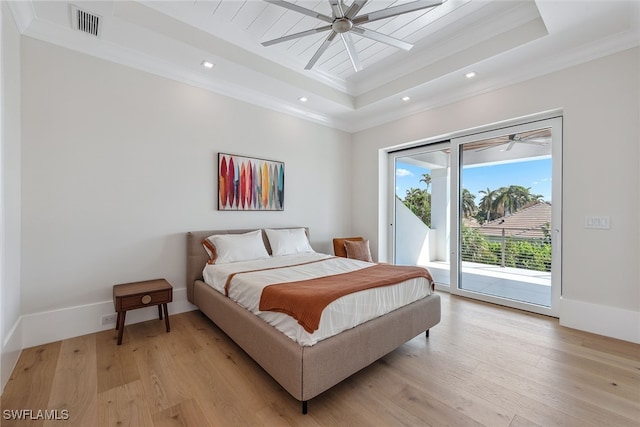 bedroom with ceiling fan, access to outside, ornamental molding, and light wood-type flooring