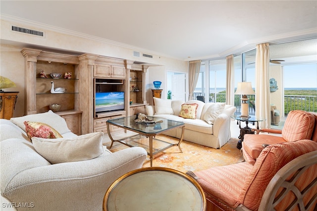 living room with ornamental molding