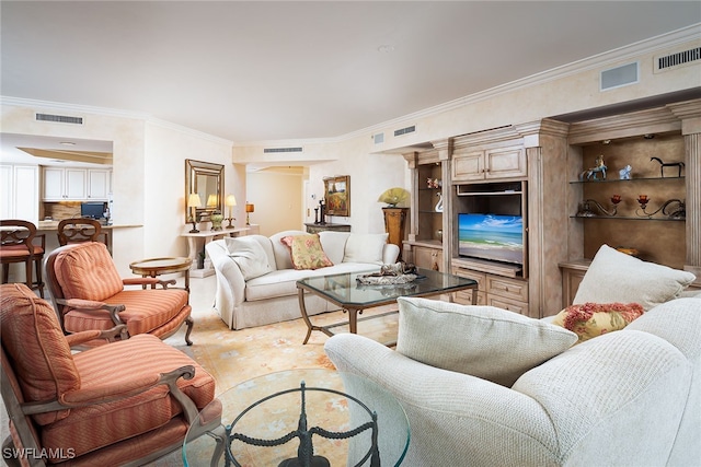 living room featuring crown molding