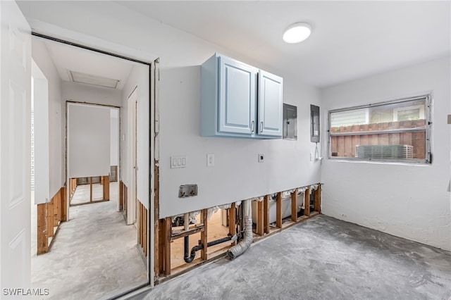 2472 Harbor Rd, Naples, FL 34104 - spare room featuring unfinished concrete flooring, electric panel, and attic access
