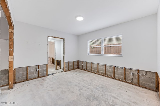 2472 Harbor Rd, Naples, FL 34104 - spare room with unfinished concrete floors