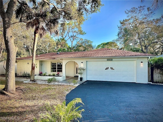 ranch-style home with a garage