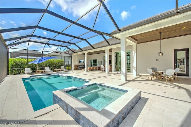 view of pool featuring glass enclosure, a patio, outdoor dining area, and a pool with connected hot tub