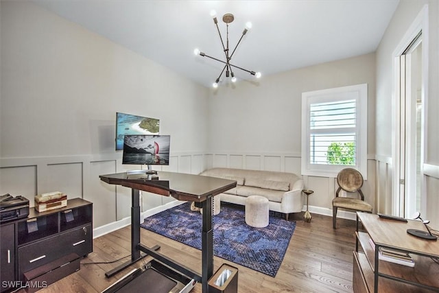 interior space featuring hardwood / wood-style floors and a notable chandelier