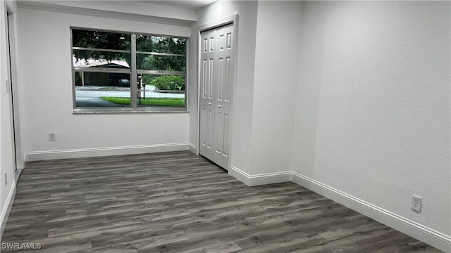 interior space with dark hardwood / wood-style flooring