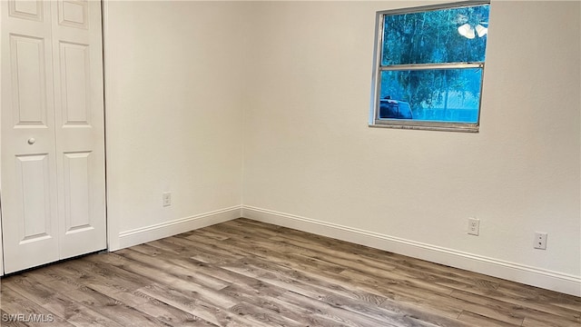 unfurnished bedroom featuring wood-type flooring