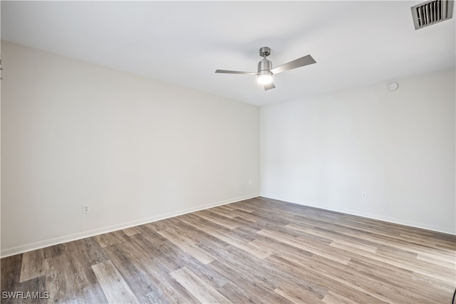 unfurnished room with light hardwood / wood-style floors and ceiling fan