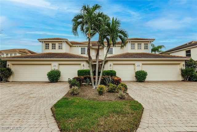 view of front of property with a garage