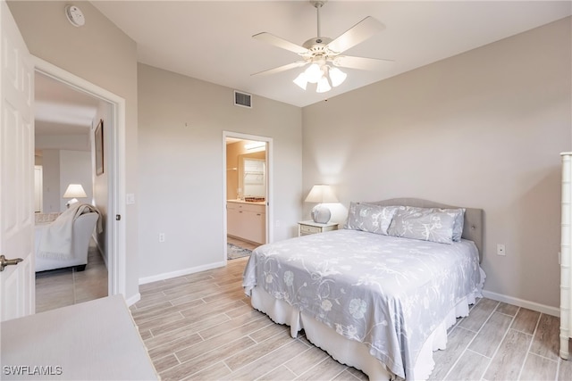 bedroom featuring ceiling fan and connected bathroom