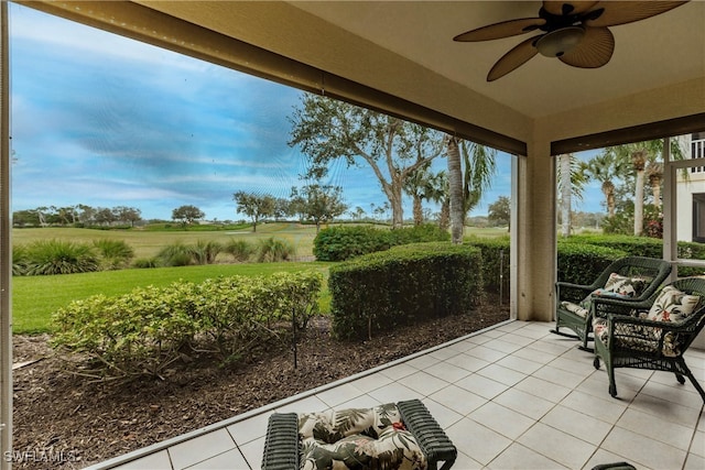 unfurnished sunroom with a rural view