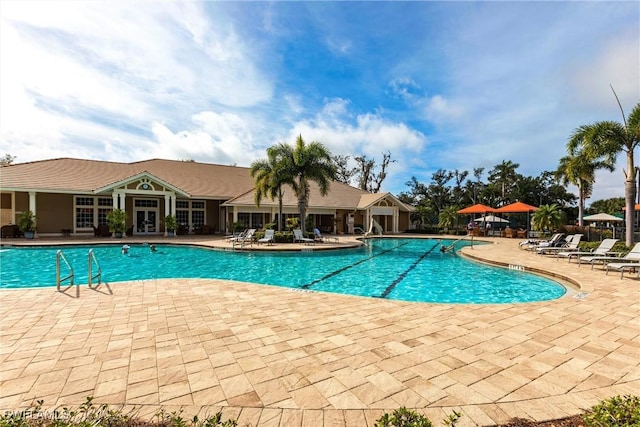 view of pool featuring a patio area