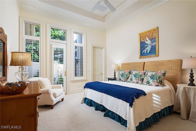 bedroom featuring crown molding, multiple windows, carpet floors, and ceiling fan