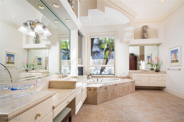 bathroom featuring a chandelier, ornamental molding, vanity, tiled tub, and tile patterned flooring