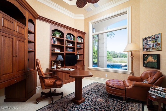 office space with crown molding, carpet, and ceiling fan