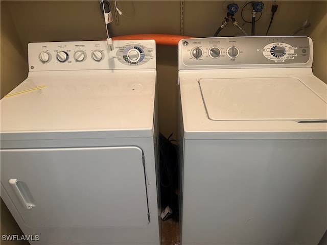 laundry room featuring independent washer and dryer