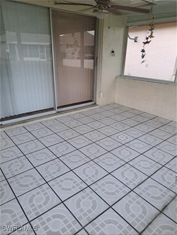 view of patio with ceiling fan