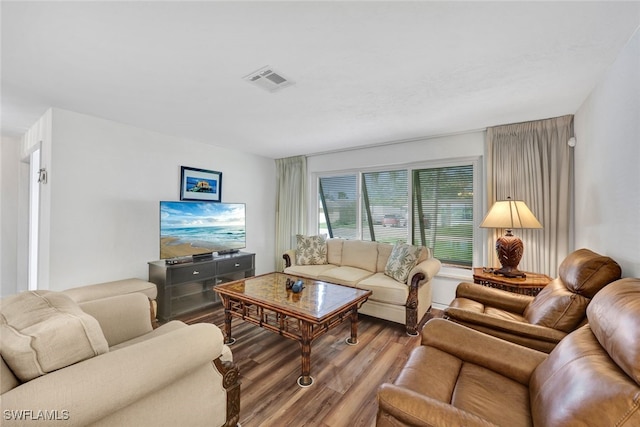 living room with light hardwood / wood-style flooring