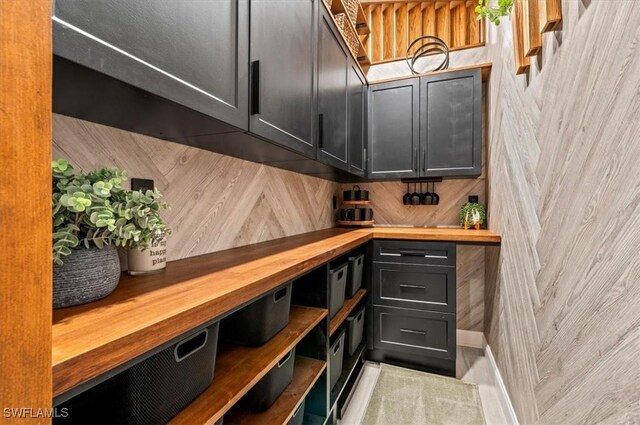 bar with wooden walls and wood counters