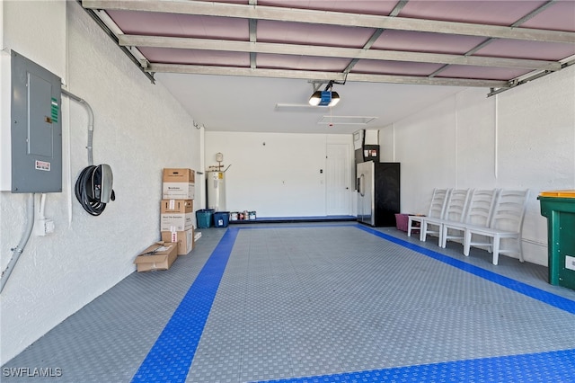 garage with electric panel and a garage door opener