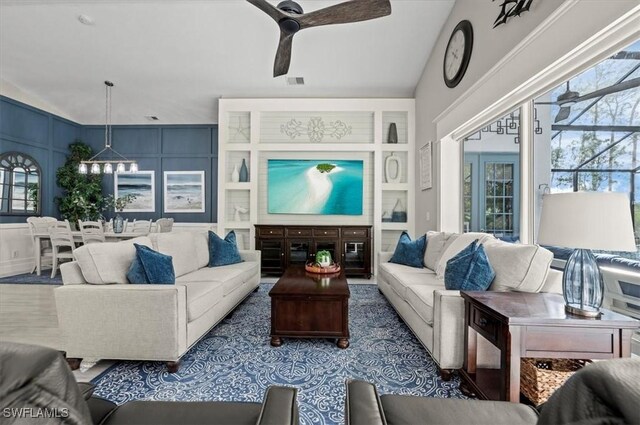 living room with ceiling fan