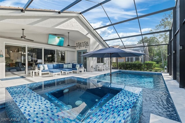 view of pool featuring ceiling fan, a lanai, an outdoor hangout area, an in ground hot tub, and a patio