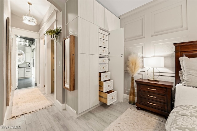 bedroom featuring light wood-type flooring