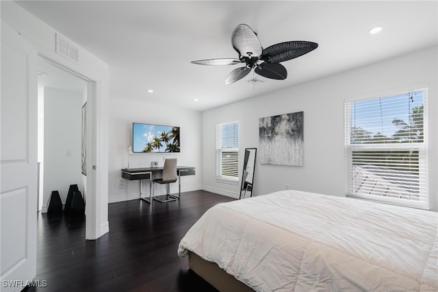 bedroom featuring dark wood-type flooring and ceiling fan