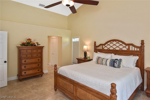 9812 Fathom Ct, Fort Myers, FL 33919 - bedroom with high vaulted ceiling, ceiling fan, baseboards, and light tile patterned floors