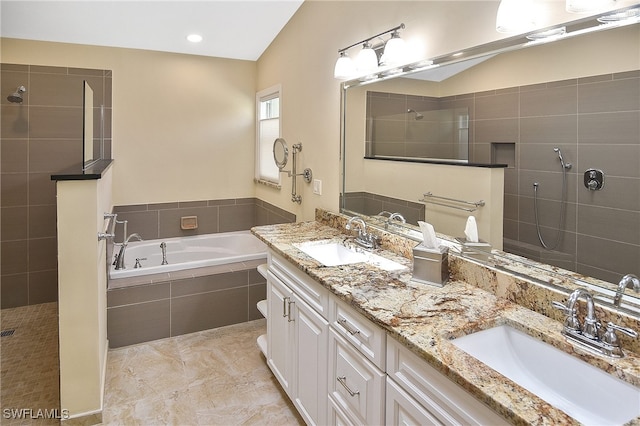 bathroom featuring vanity, plus walk in shower, and lofted ceiling