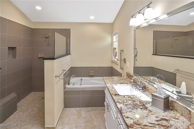 bathroom with vanity, plus walk in shower, and lofted ceiling