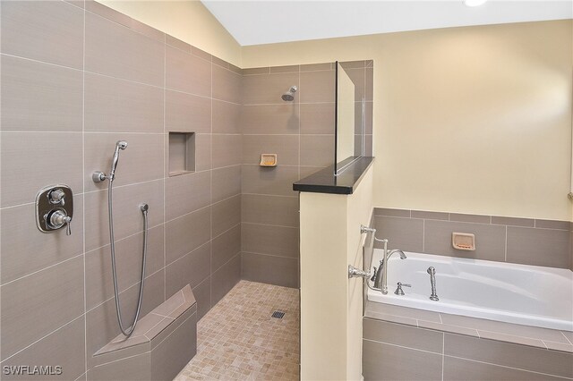 9812 Fathom Ct, Fort Myers, FL 33919 - bathroom with a garden tub and a tile shower