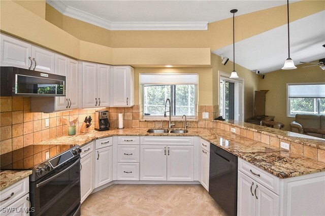 9812 Fathom Ct, Fort Myers, FL 33919 - kitchen featuring black appliances, a sink, a peninsula, white cabinetry, and crown molding