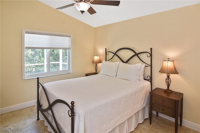 9812 Fathom Ct, Fort Myers, FL 33919 - bedroom with baseboards, vaulted ceiling, and ceiling fan