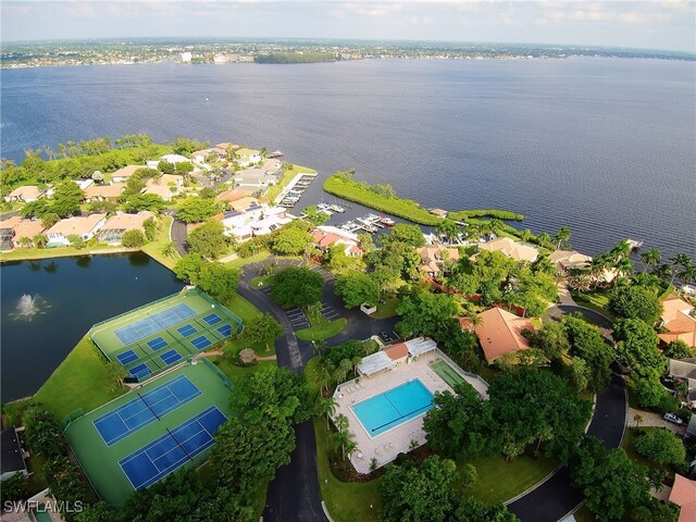 9812 Fathom Ct, Fort Myers, FL 33919 - aerial view of residential area featuring a large body of water and a pool area