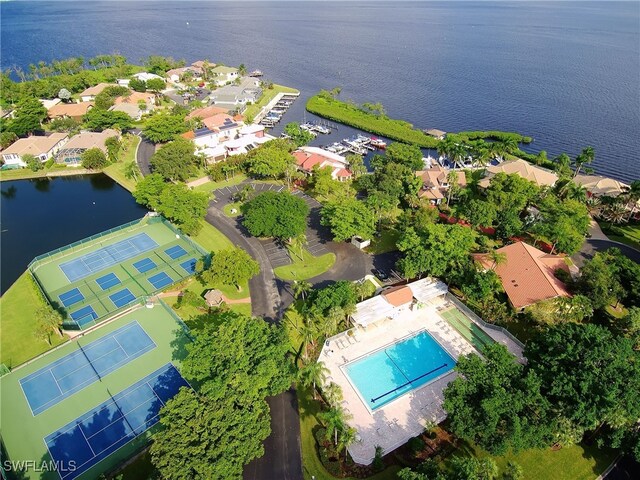9812 Fathom Ct, Fort Myers, FL 33919 - aerial perspective of suburban area with a nearby body of water and a pool area