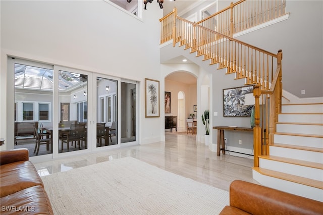 entryway featuring a high ceiling