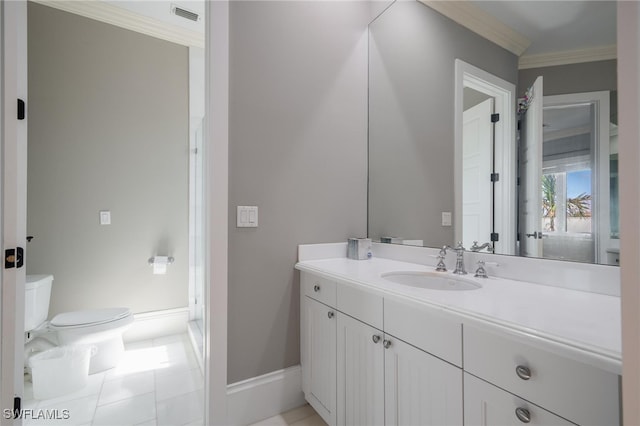 bathroom featuring vanity, toilet, ornamental molding, and tile patterned flooring